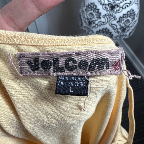 Volcom yellow drop waist mini dress with ruffles and flowers.  Size large - Picture 7 of 8